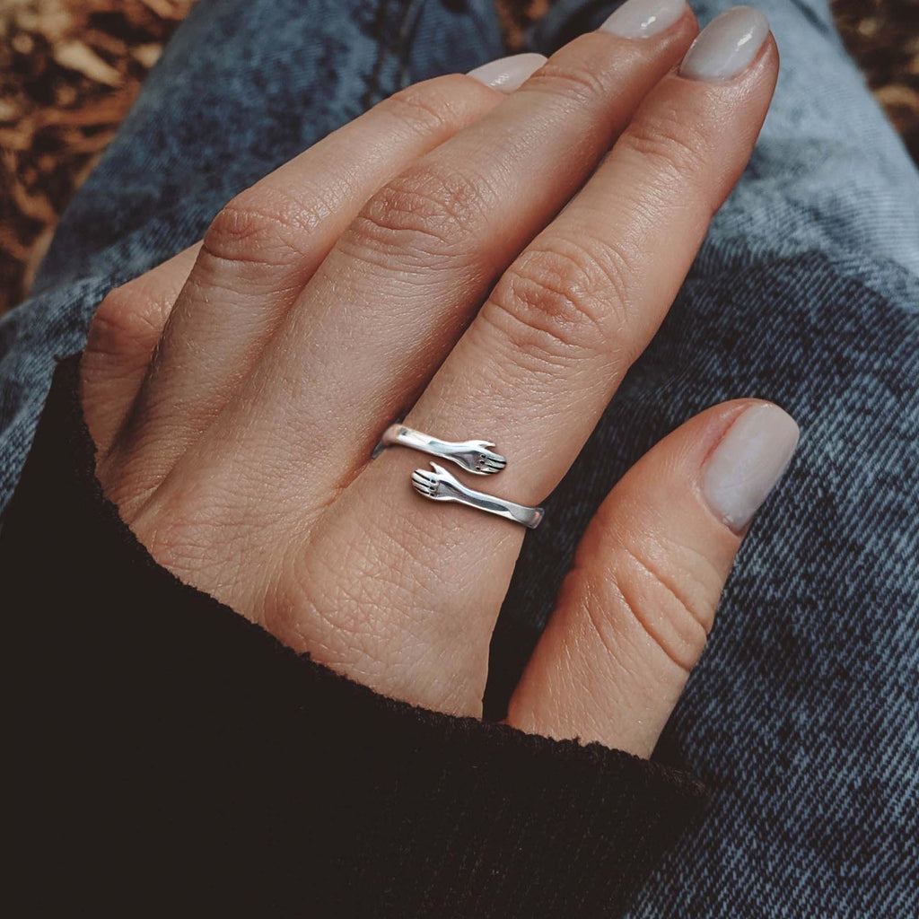 Embrace Your Love: The Sterling Silver Hug Ring
